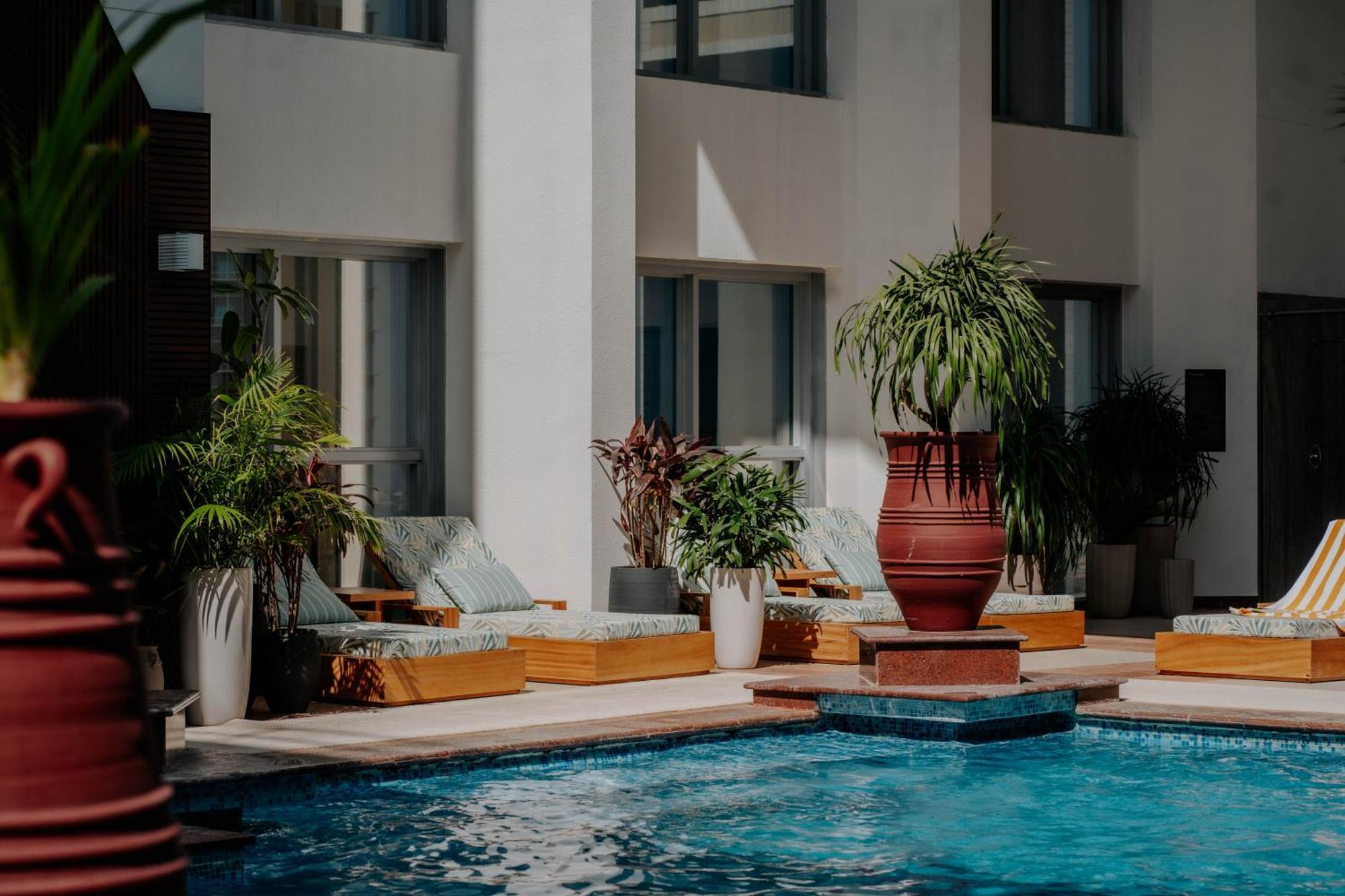 Dusit Thani Dubai Exterior photo The pool at the hotel